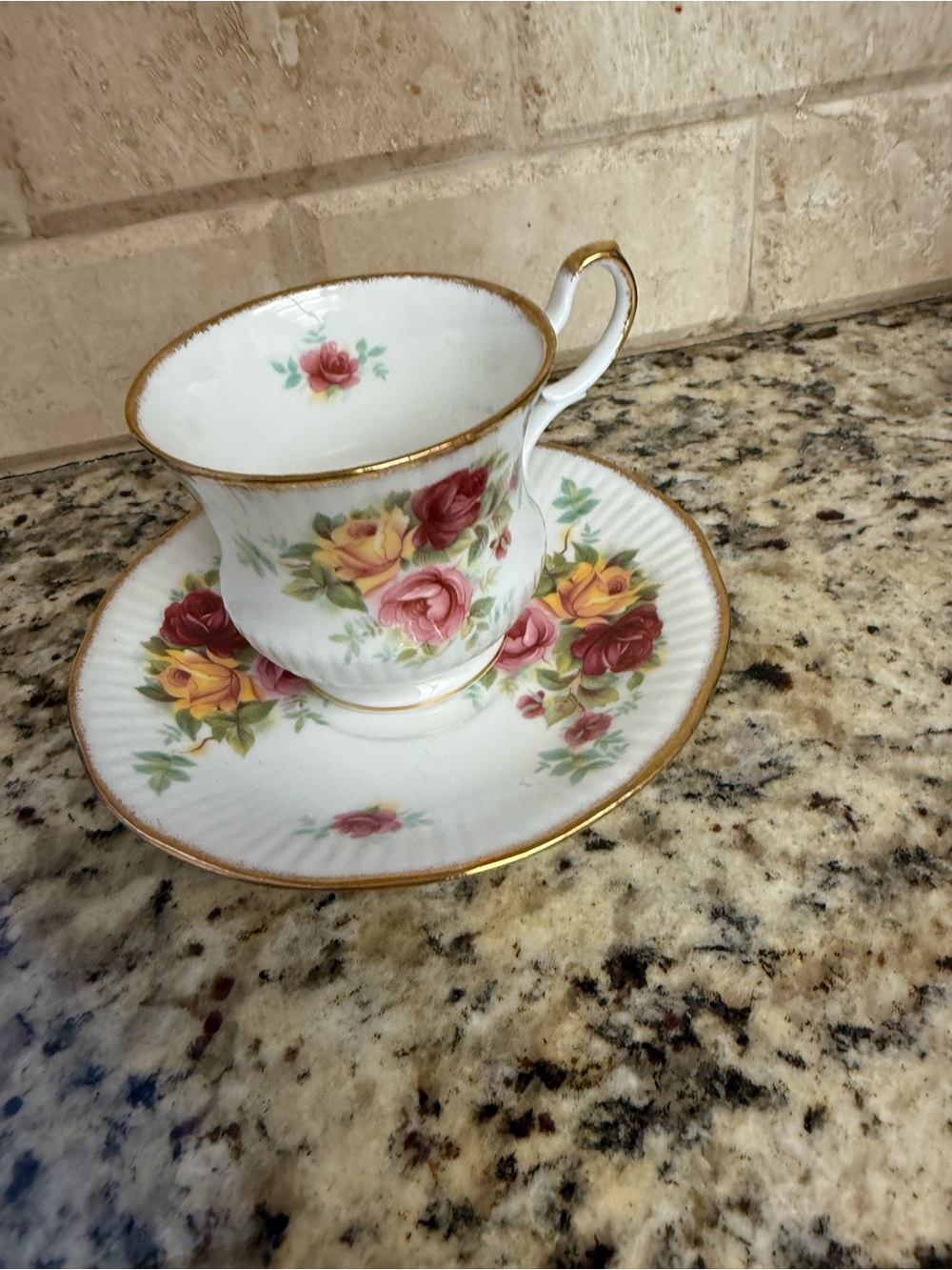 Porcelain Teacup and Saucer Set with Pink and Yellow Rose Pattern